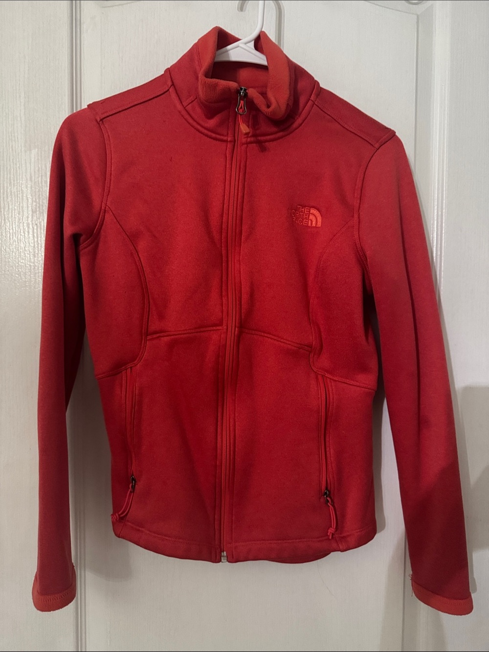 Women's red full-zip fleece jacket